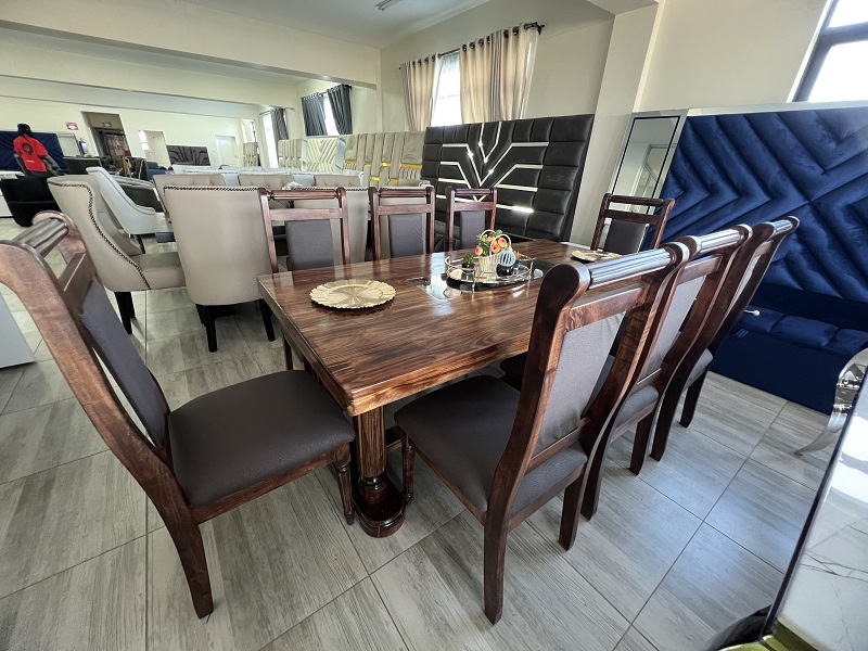 8-seater dining suite with cushioned backrest and wood 